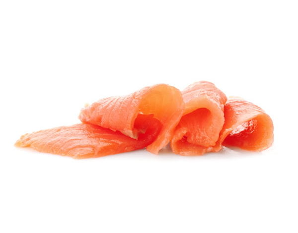 fresh sliced salmon fillet on white background